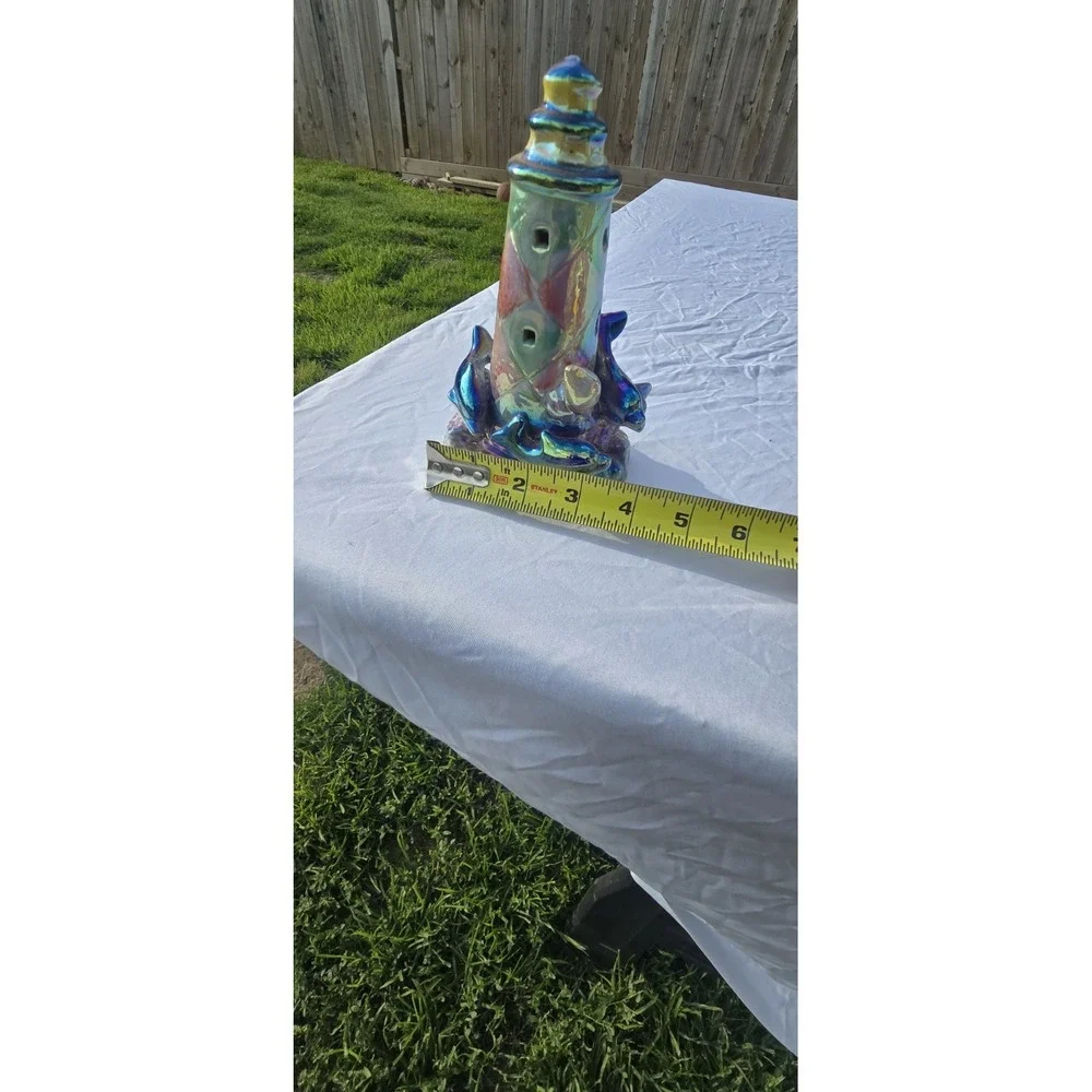 vintage iridescent ceramic dolphin lighthouse figurine